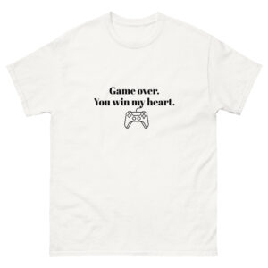 A white t-shirt with black text and graphic design that reads “Game over. You win my heart.” and shows a game controller