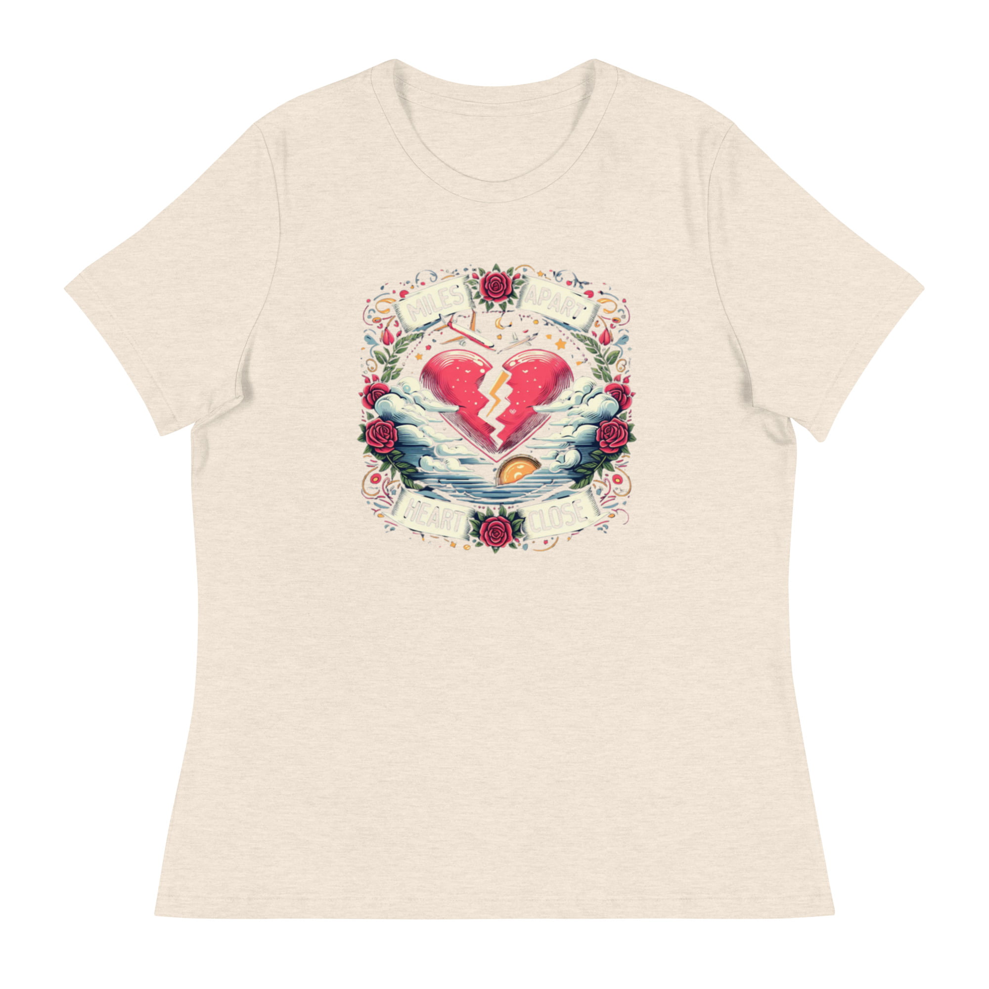 A t-shirt featuring a vibrant design of a split heart surrounded by roses and clouds with the text “Miles Apart, Heart Close”, symbolizing the unbreakable bond in long-distance relationships.